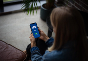 Woman Verifying Mobile Application - Application Management